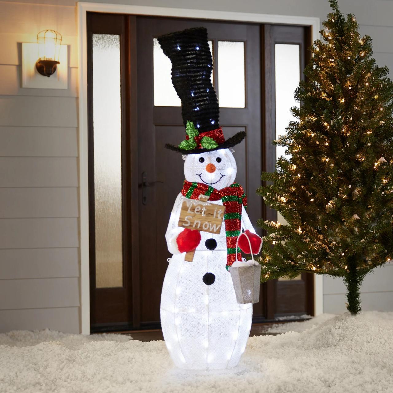 lowes christmas outdoor decor Holiday Living 48in Tall Lighted Snowman in the Outdoor Christmas