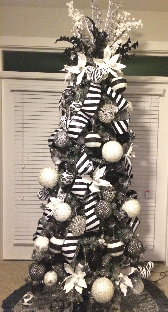 black and white christmas decor Dark gray/pewter tree with black, white, silver and bling ornaments Black christmas tree