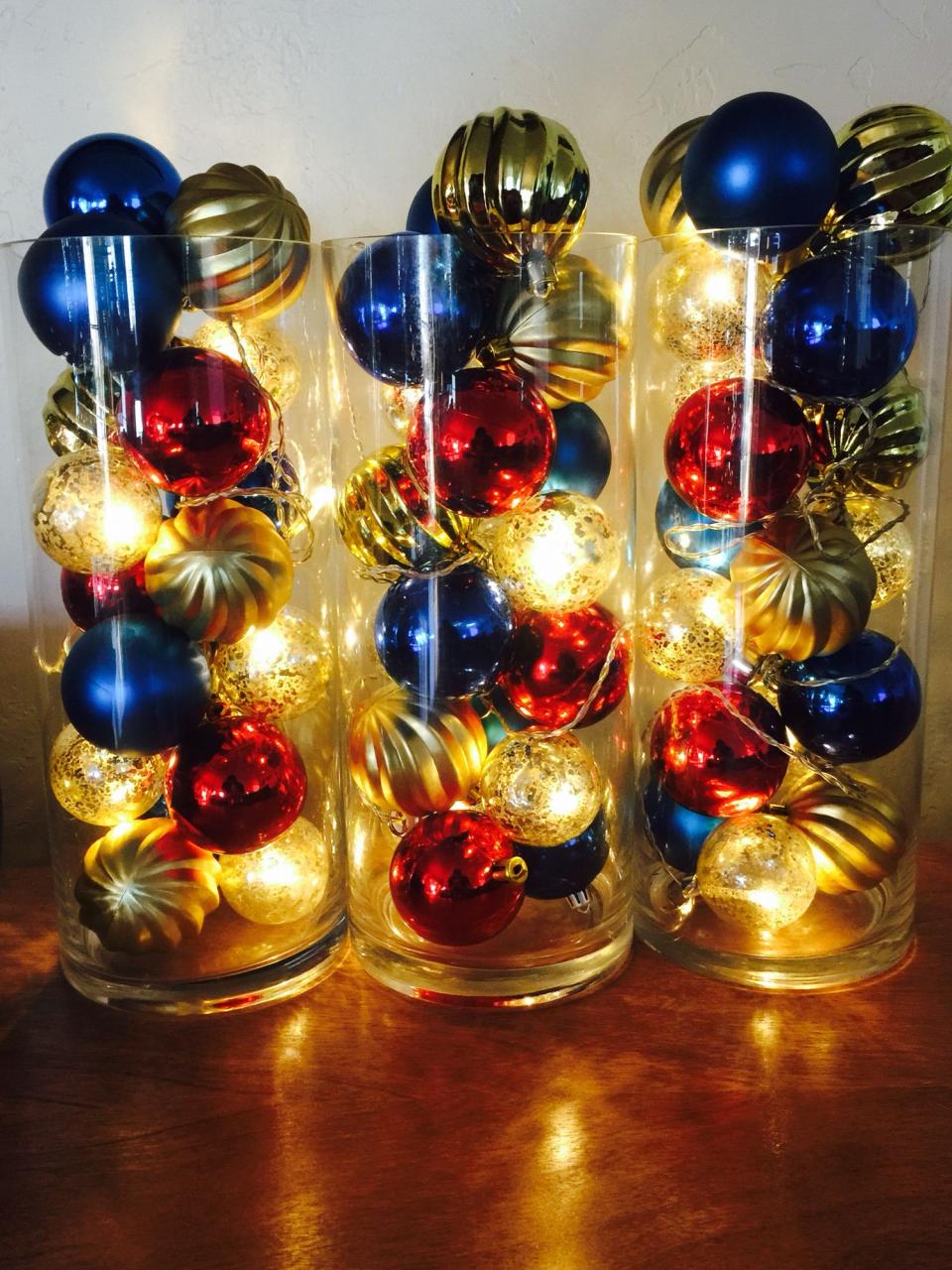 christmas decoration ideas for vases Create a dramatic glowing holiday centerpiece with a glass cylinder