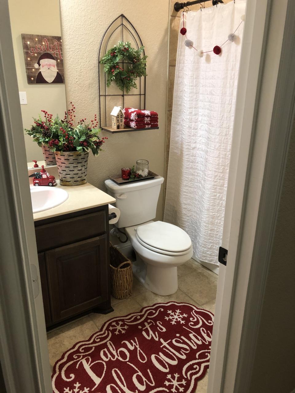 christmas decor for bathroom a bathroom decorated for christmas with red and white decorations on the shower curtain, toilet