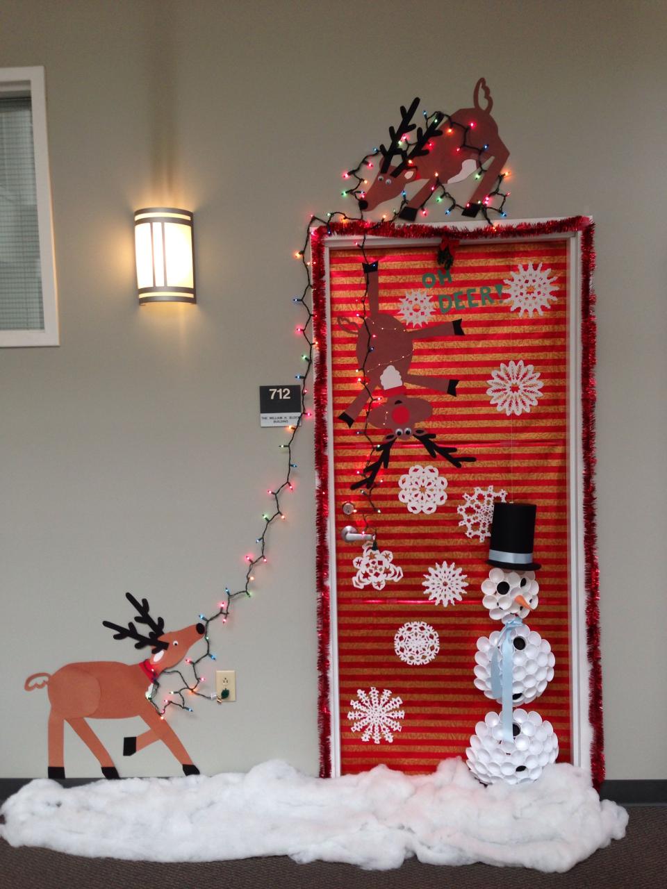 diy christmas decor for door Our Christmas door decoration FIRST PLACE!! Made snowman with Dixie cups. R… Diy christmas