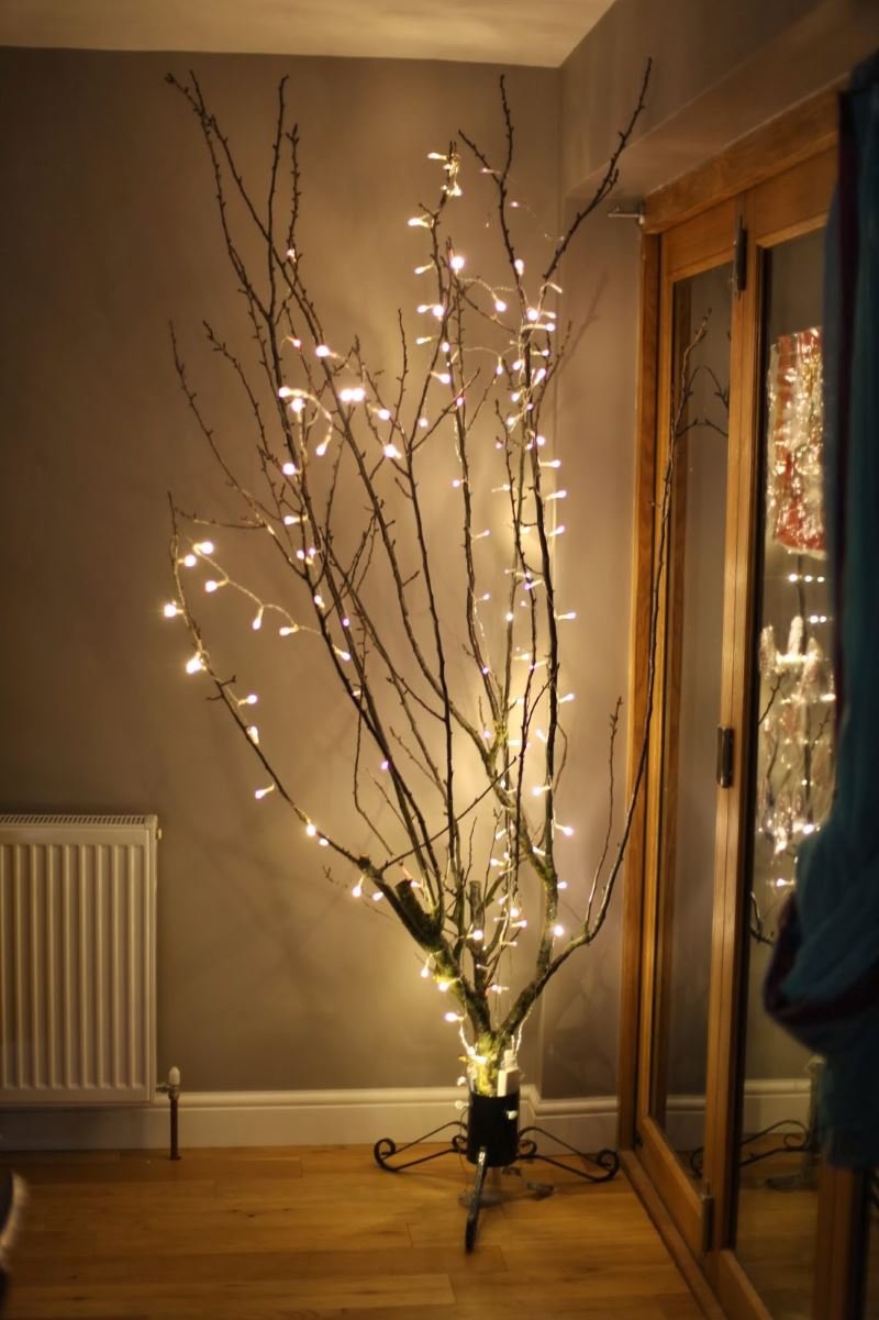 christmas decor with branches Keep the Holiday Glow Alive with These Winter Decor Ideas