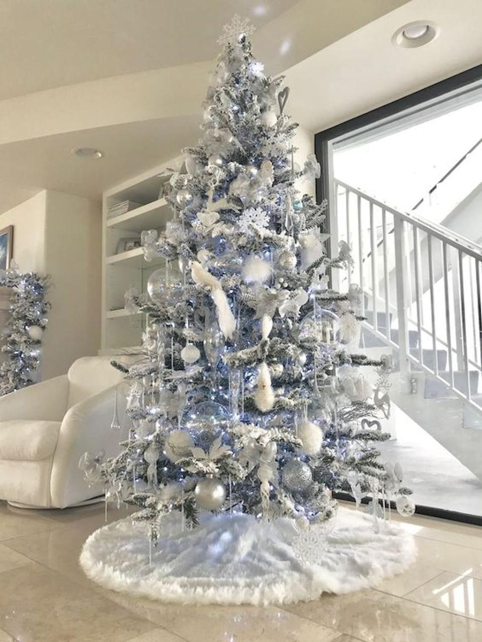 elegant white christmas tree decor 48 Stunning White Christmas Tree Ideas To Decorate Your Interior PIMPHOMEE