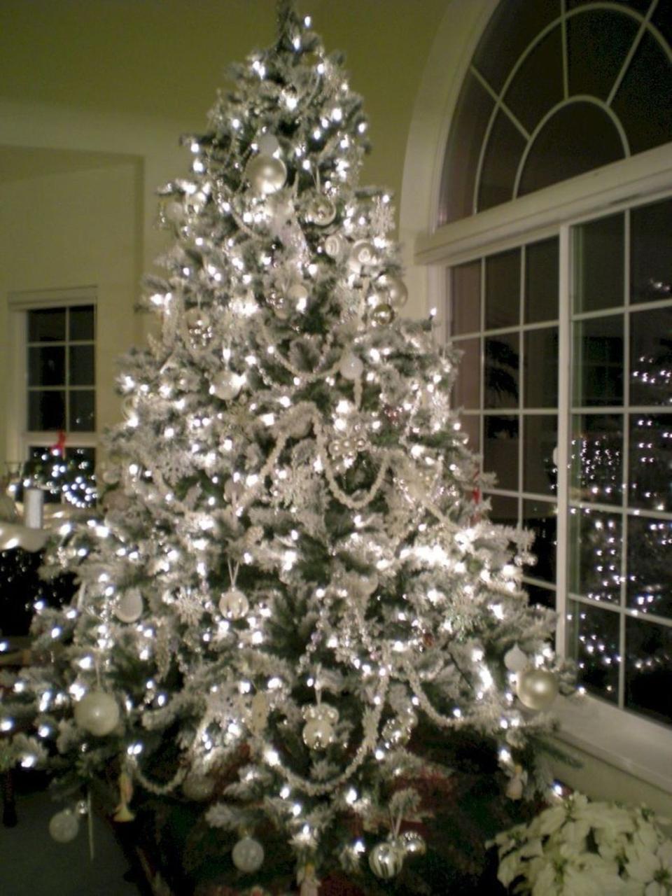 green christmas tree with white decor 48 Stunning White Christmas Tree Ideas To Decorate Your Interior