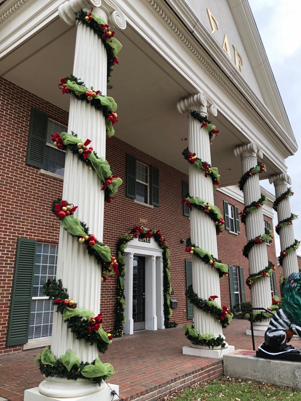 christmas decor for pillars Traditional Garland wrapped columns by Roger Spruill Hob Nob Decor. Outside christmas