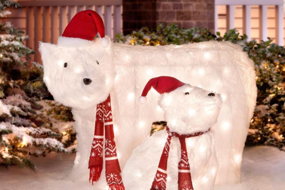 polar bear outdoor christmas decor Tis Your Season 48" Polar Bear and Penguin Sledding Tinsel Outdoor Christmas Decoration