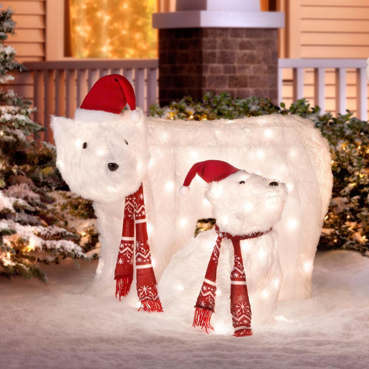 polar bear outdoor christmas decor Tis Your Season 48" Polar Bear and Penguin Sledding Tinsel Outdoor Christmas Decoration