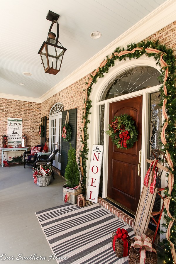 farmhouse christmas front porch decor 25 Beautiful Farmhouse Christmas Porches Honeybear Lane