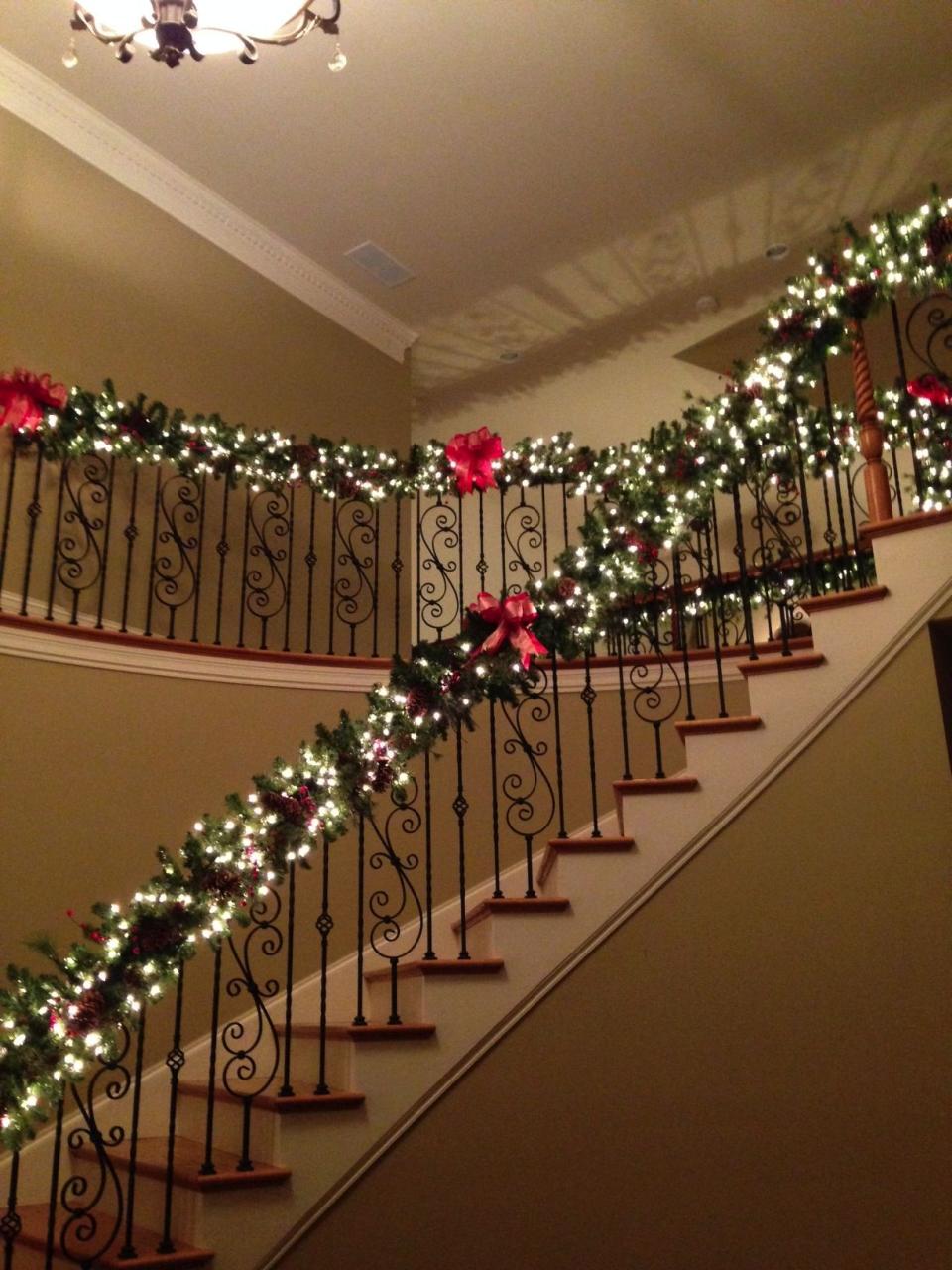 christmas decor staircase garlands Frontgate prelit garlands, some ribbon to make the bows and a little