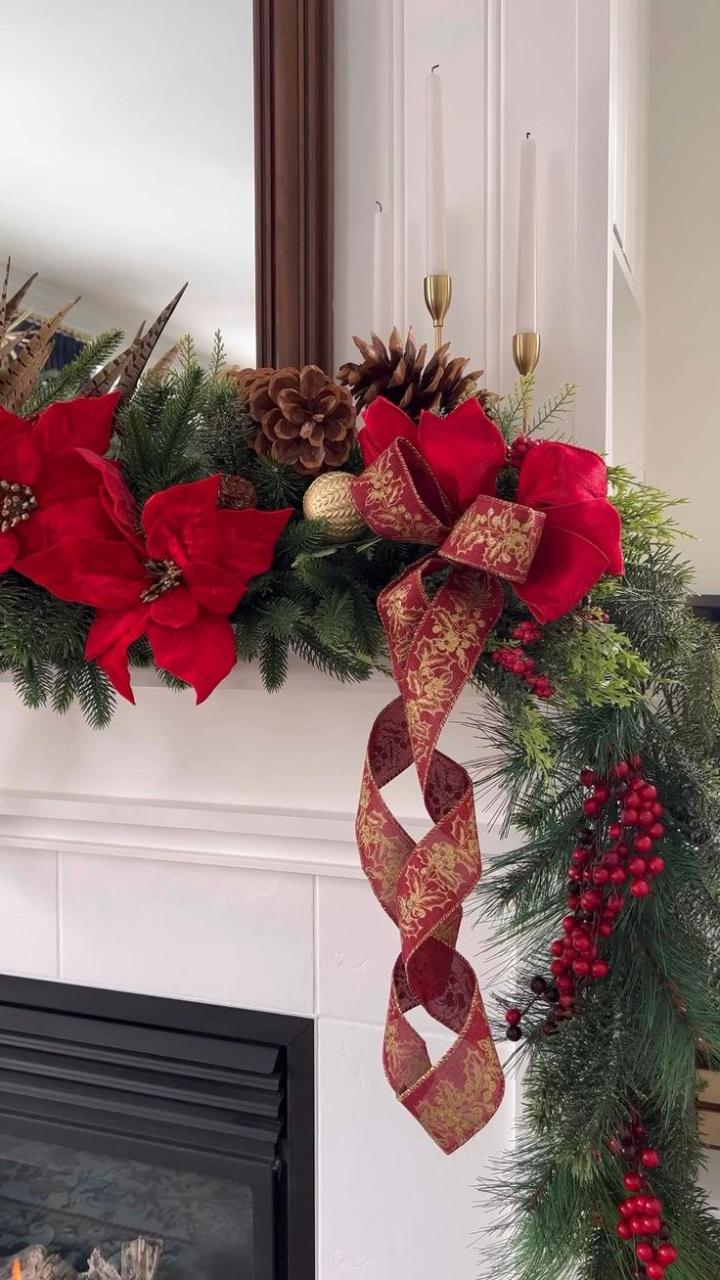 gold christmas mantel decor Classic red and gold mantel decor with poinsettias, berries, bows and