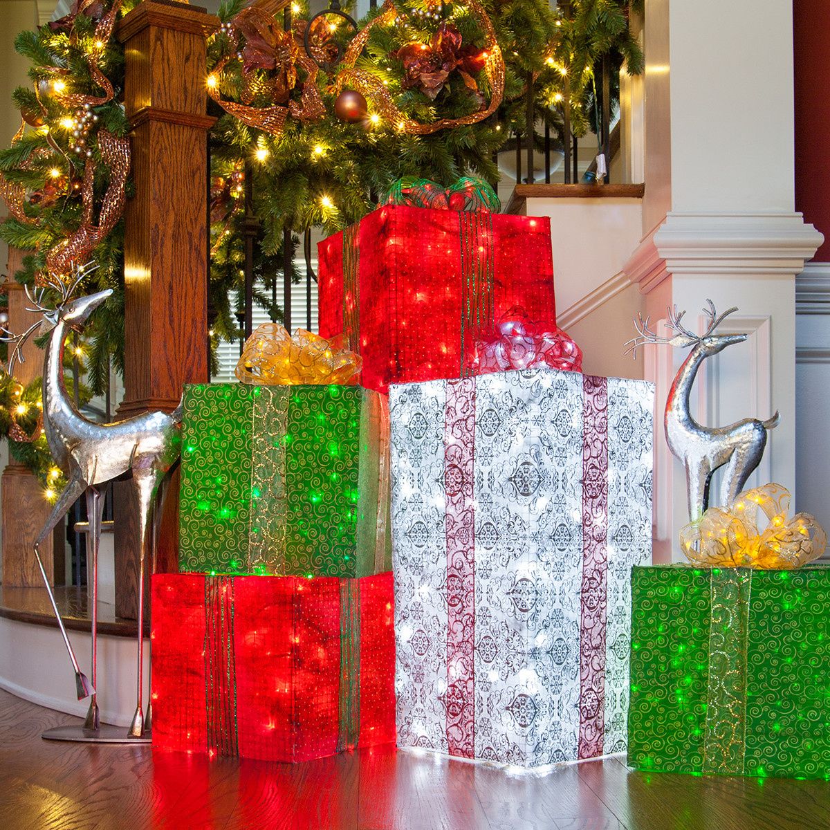 outdoor christmas decor presents Use chicken wire, fabric and string lights to create DIY lighted