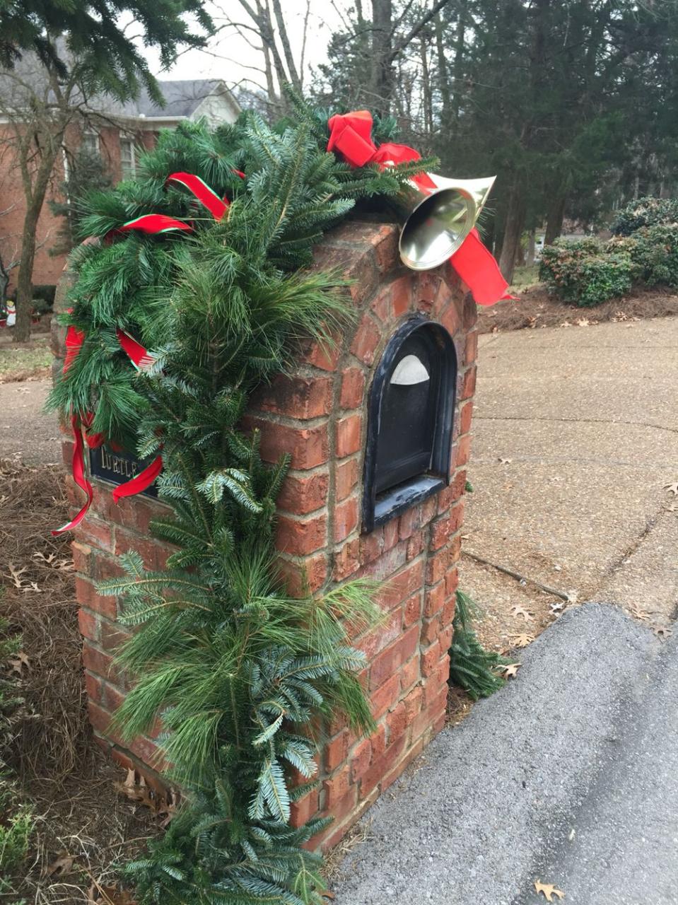 christmas mail box decor Another great idea for a domed brick mailbox. Love the bells and ribbon