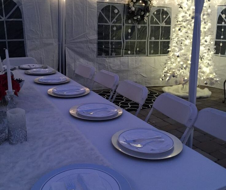 christmas decorations outdoor party Outdoor tent. Christmas party table settings for a Winter Wonderland