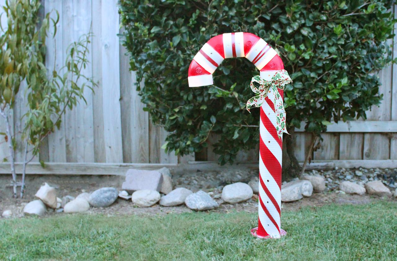 christmas canes outdoor decor This article shows how to make a lighted PVC candy cane decoration to