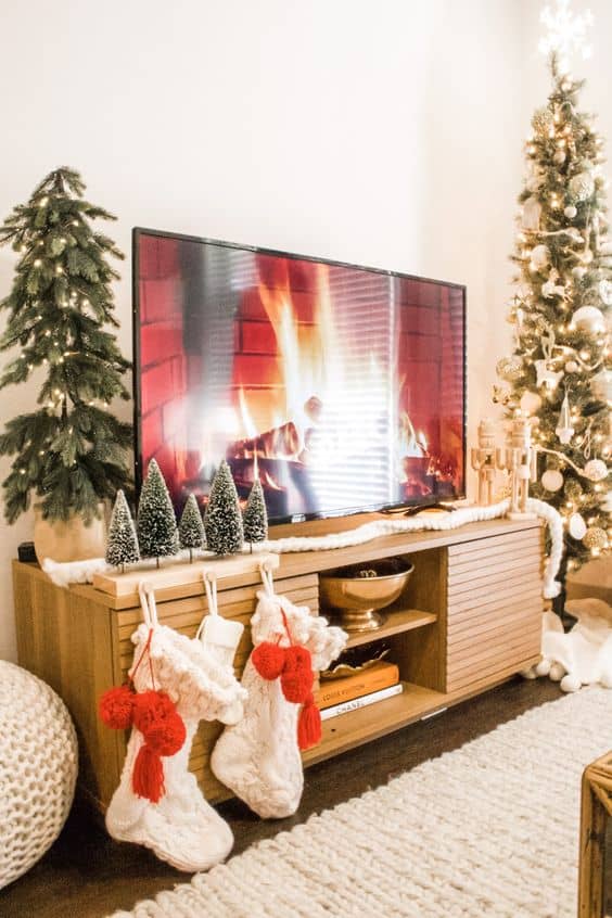 christmas decor under tv 20 Christmas TV Stand Styling Ideas » Lady Decluttered