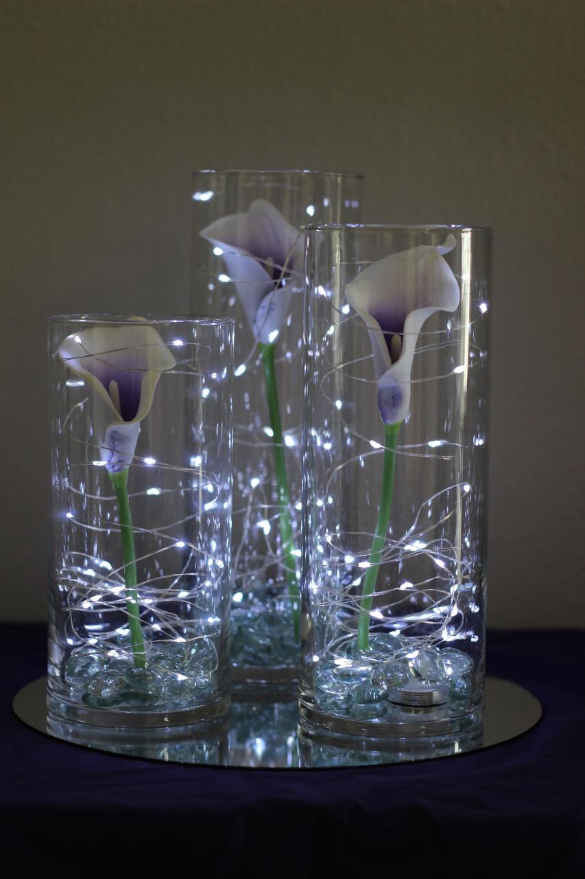 christmas decorating ideas glass vases Picasso calla lilies in cylinder vases with fairy lights //Celebration