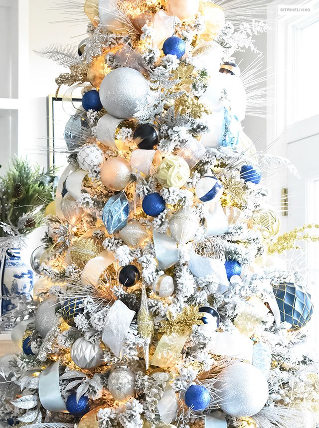 blue and gold christmas decor Flocked Christmas Tree Decor Blue, Silver + Gold CitrineLiving