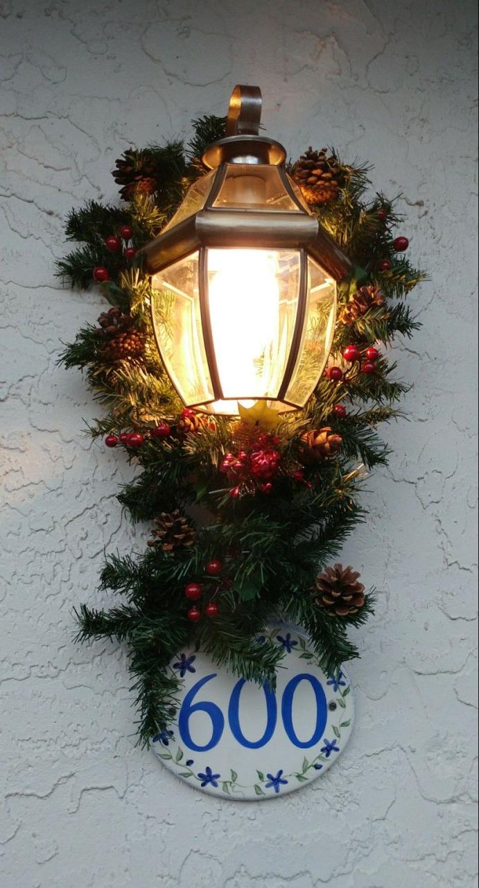 christmas decorations for outside garage lights A little garland for the lights by garage door. Outside christmas