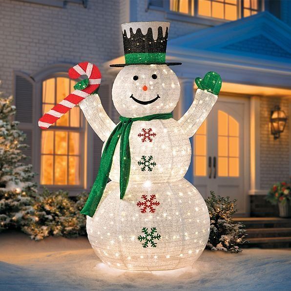 outdoor christmas decor snowman This cheery snowman LED outdoor Christmas decoration will brighten up