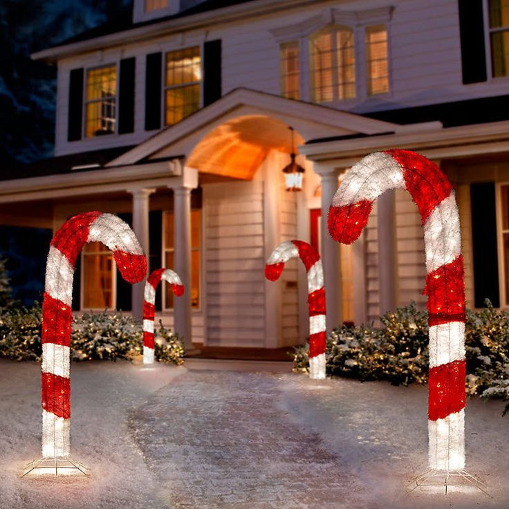 christmas canes outdoor decor Tis Your Season 4 Ft Lighted 3D Tinsel Candy Cane Outdoor Christmas