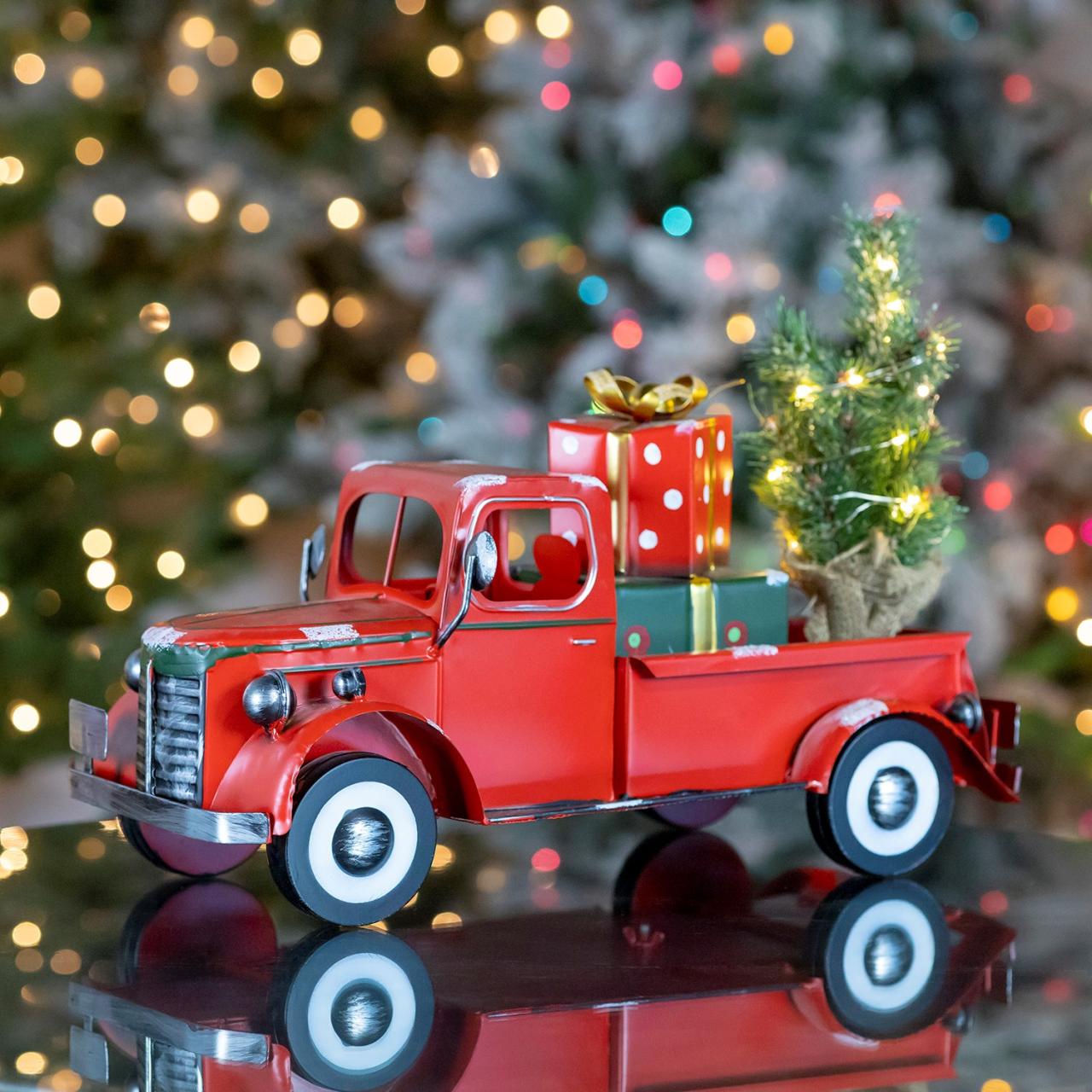 christmas truck with tree decor Snow Covered Pickup Truck with Lighted Christmas Tree and Gifts