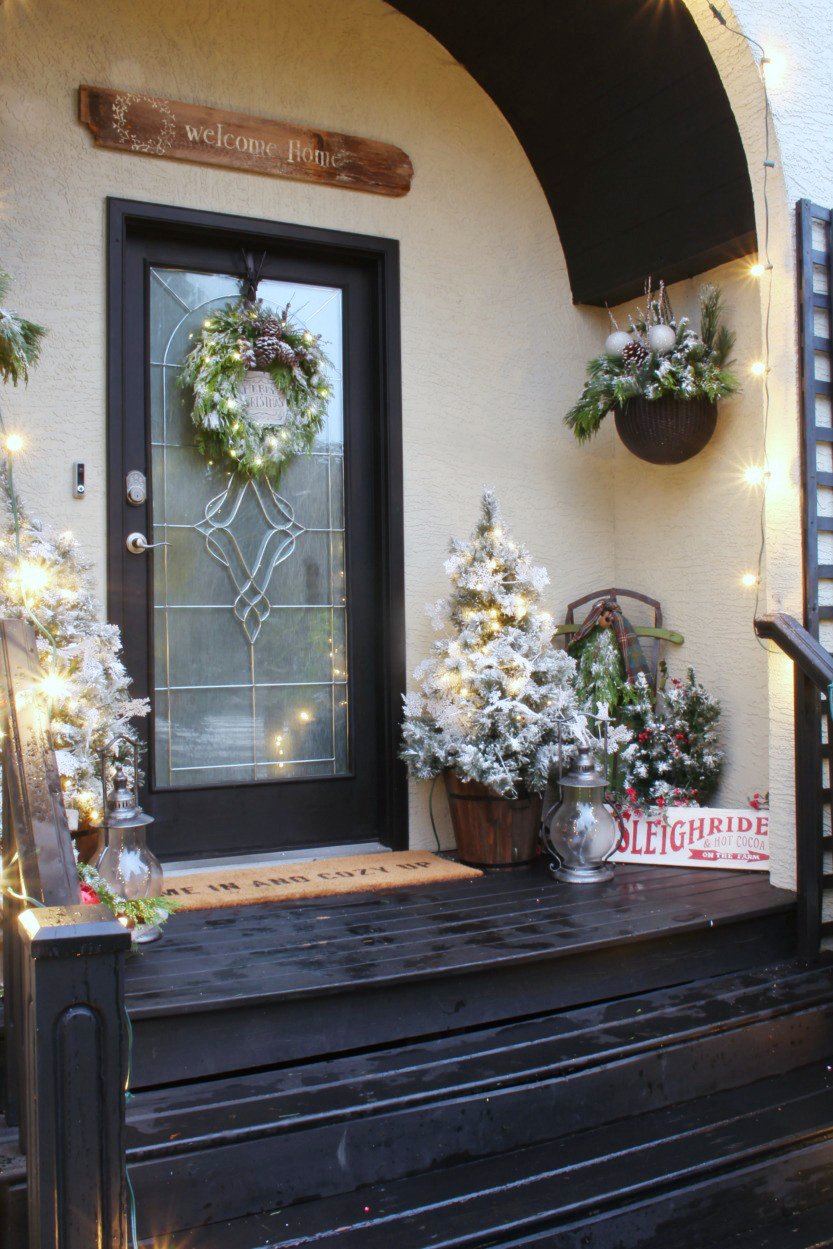 winter porch decor after christmas Our Winter Wonderland Christmas Front Porch Winter holiday