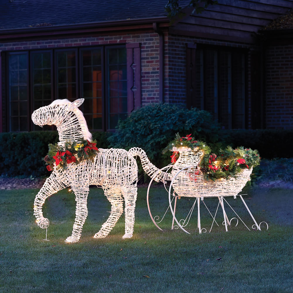 horse and sleigh christmas decor The Lighted Holiday Horse Drawn Sleigh Hammacher Schlemmer