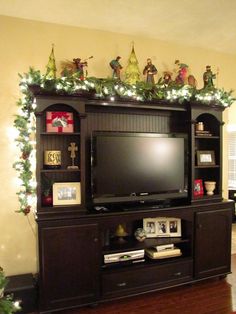 christmas decor entertainment center Festive season/holiday decor for top of entertainment center. For the