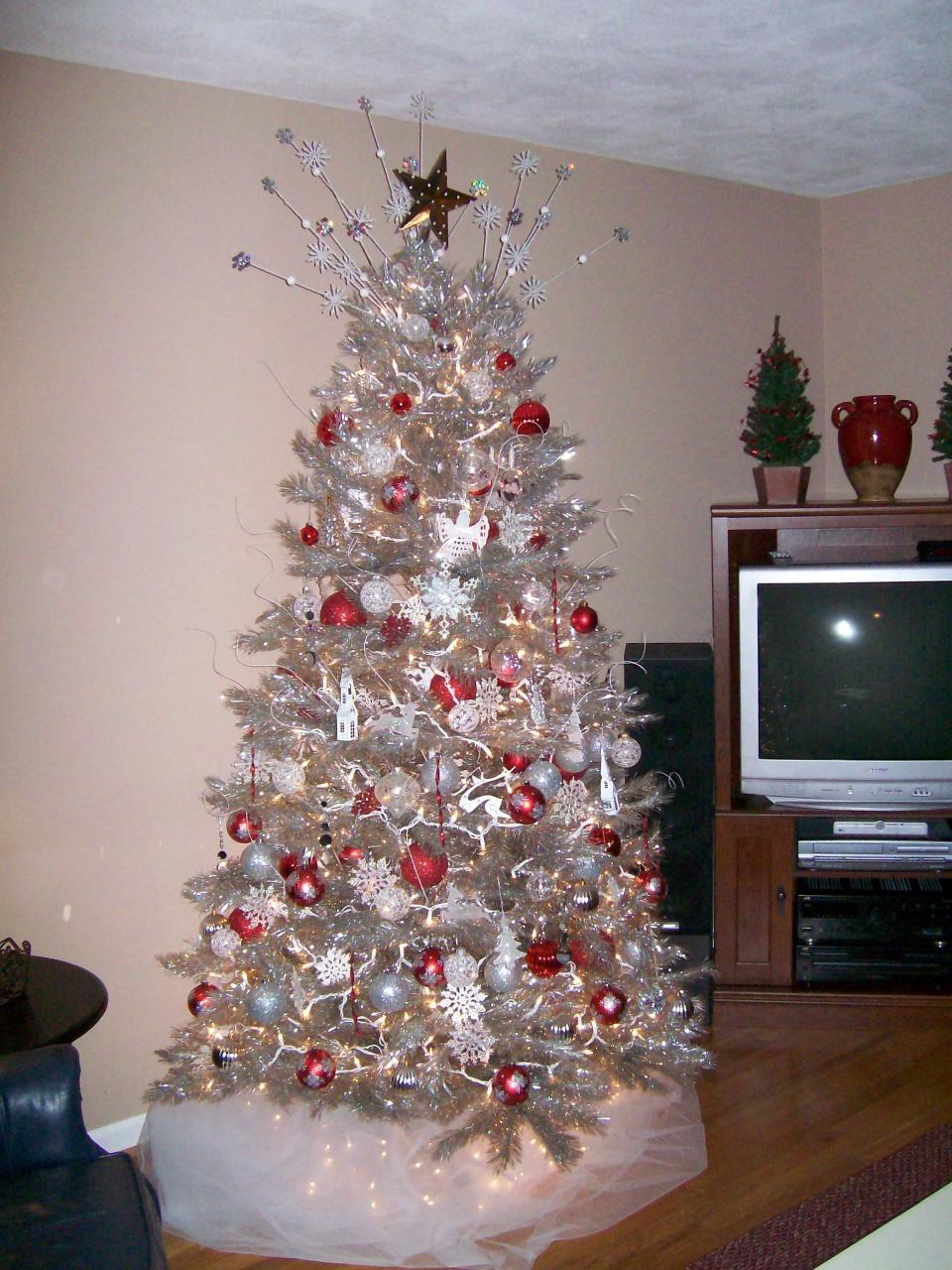 red and silver christmas tree decor Classic silver Christmas tree with red and silver decoration. Silver