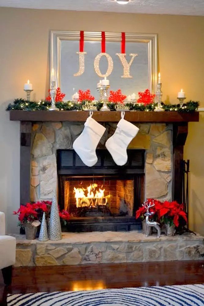 christmas decor around fireplace 24 Most Beautiful Christmas Fireplace Decorations