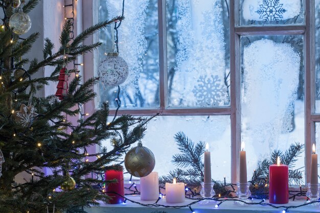 christmas decor with old windows Premium Photo Christmas decorations on old wood window