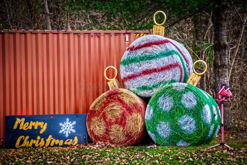 hay bale christmas decor Country Rural Scene Big Round Bales of Hay Painted Like Christmas