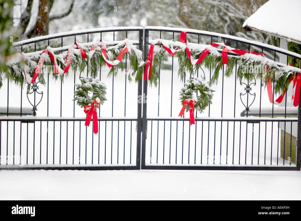 christmas decor for gates Gate with Christmas wreaths and decorations Stock Photo 13708612 Alamy