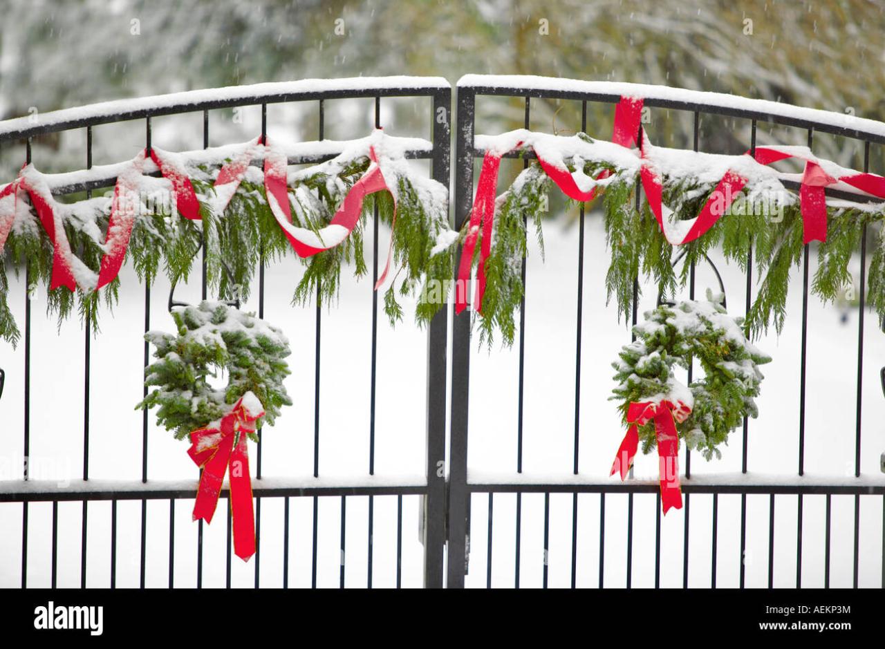 christmas decor for gates Gate with Christmas wreaths and decorations Stock Photo Alamy